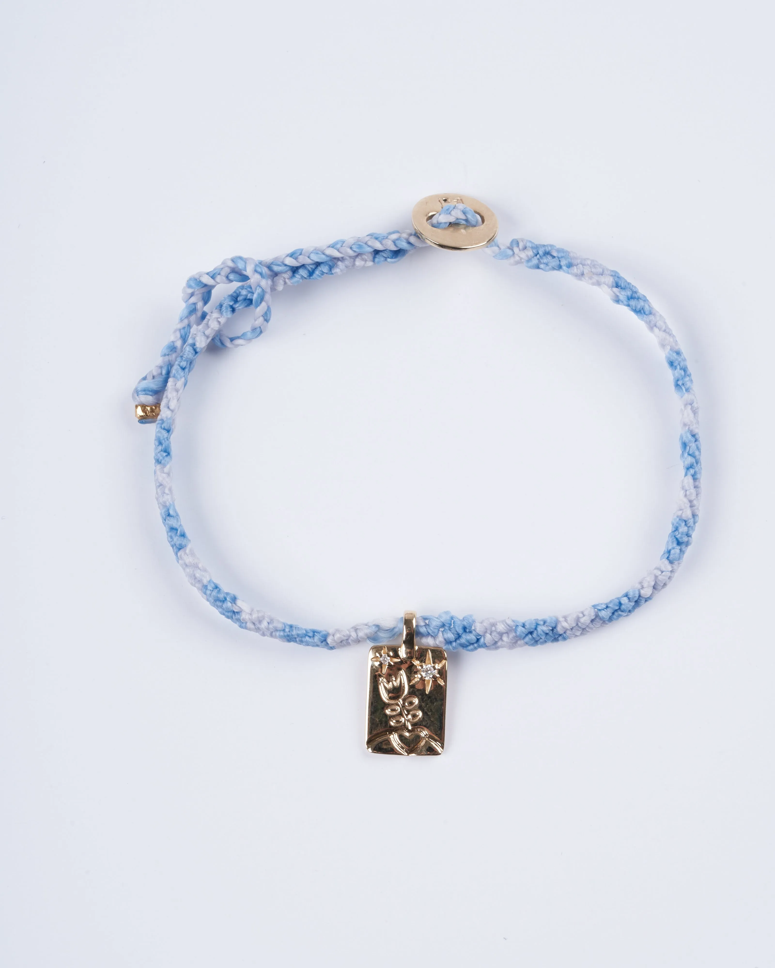 adjustable macrame bracelet with flower tag - gold