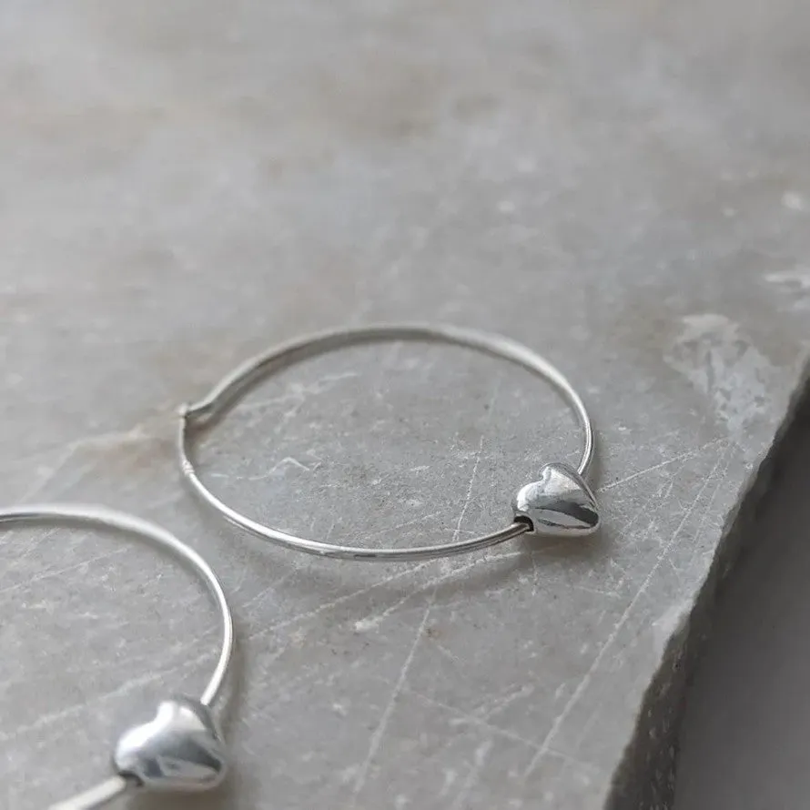 Sliding Heart Silver Hoop Earrings